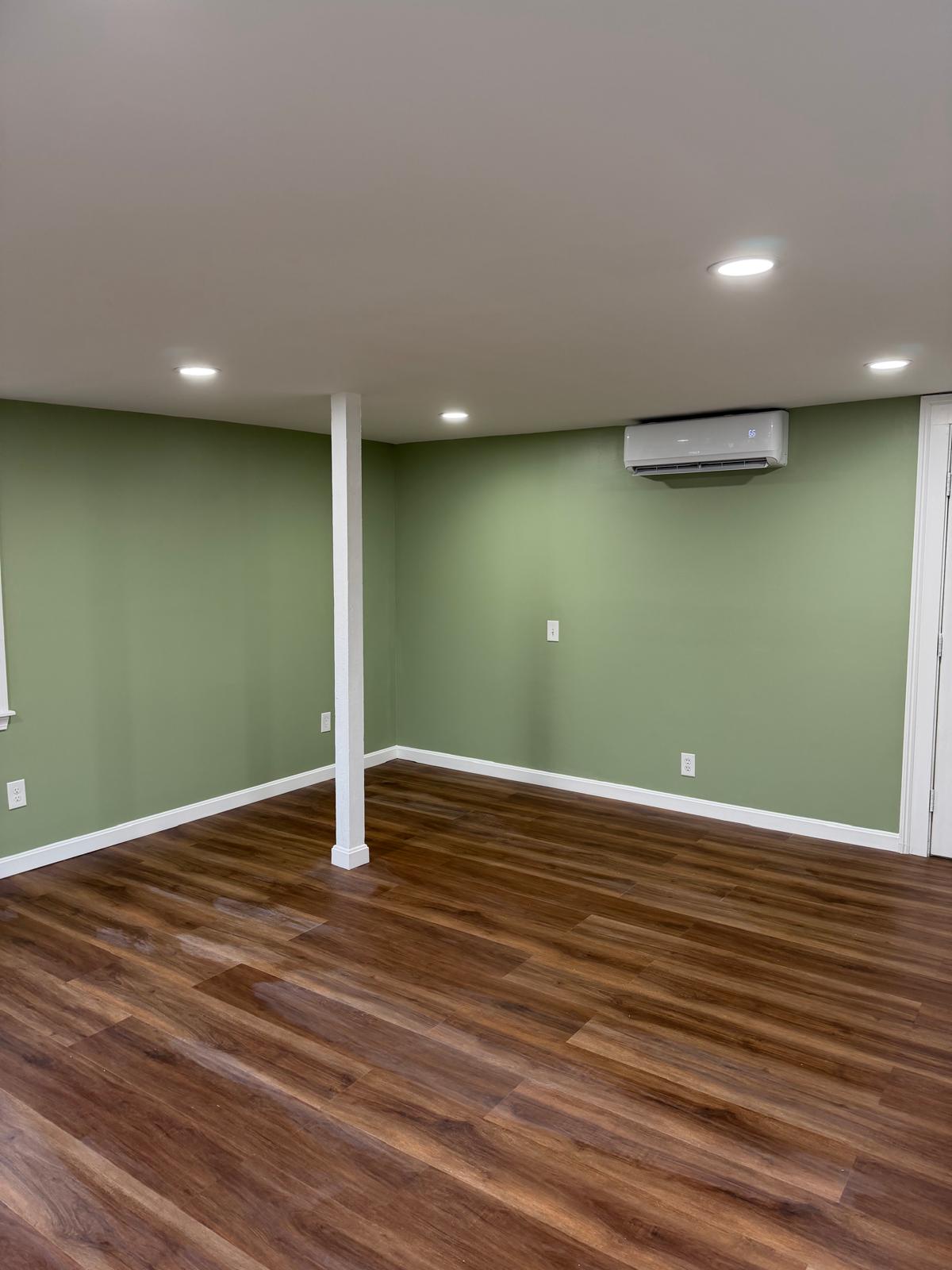 Photo 6 — After — Finished Interior Wide Room View