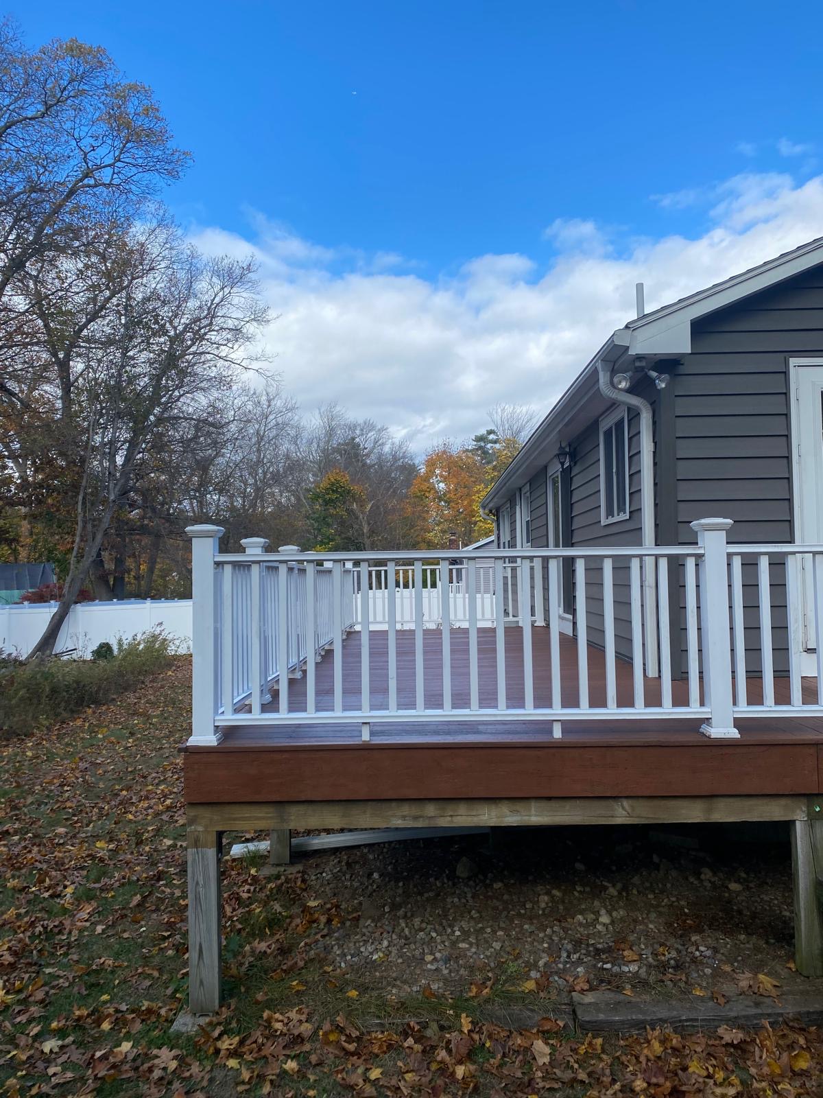 Photo 12 — After — Finished Deck with White Railing